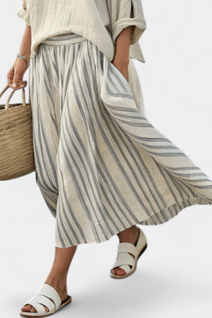Veronica – Comfortable blouse and striped midi skirt