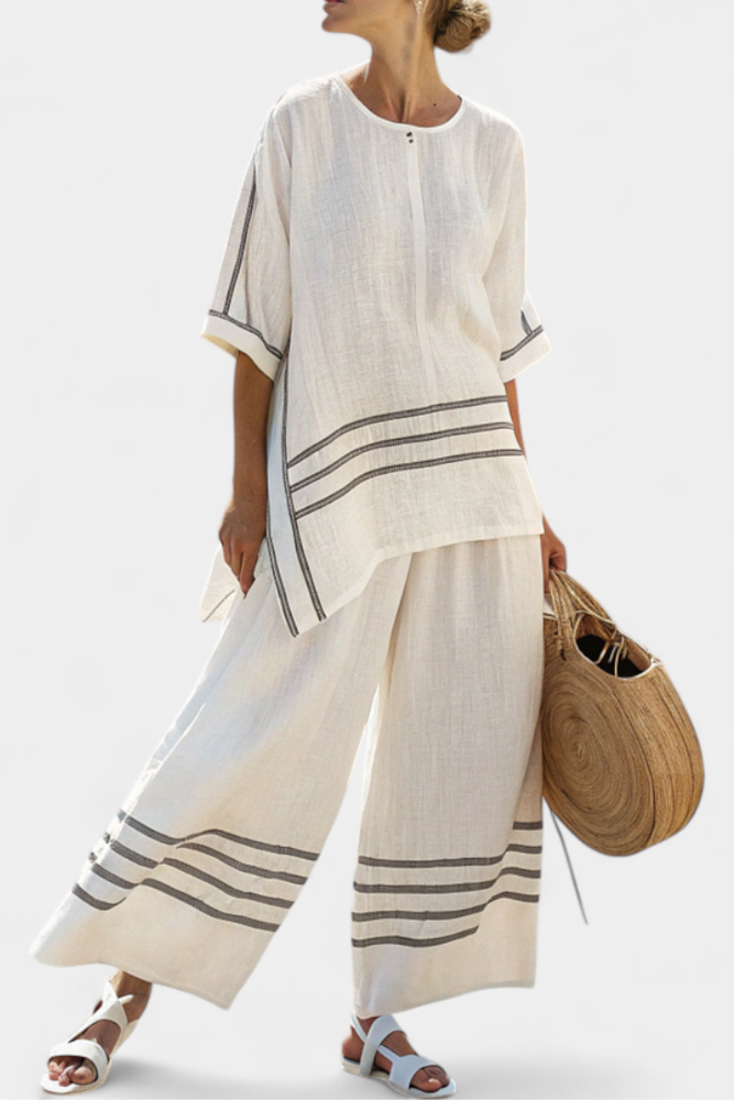 Veronica – sophisticated striped asymmetric top and bold pants