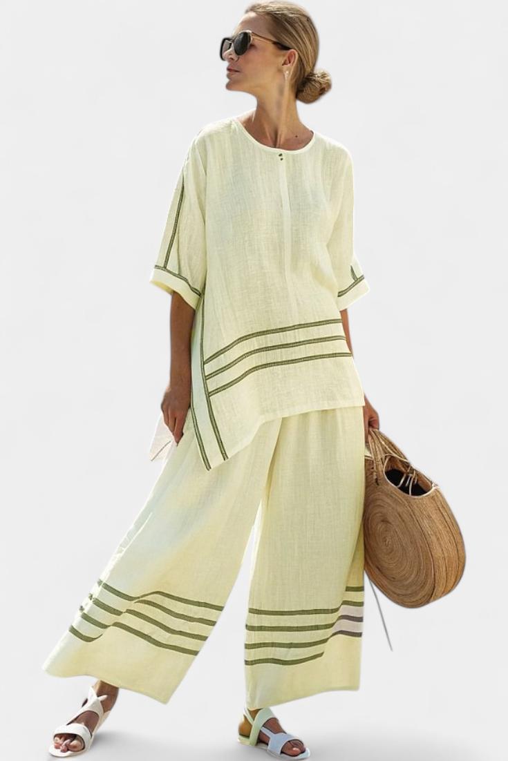 Veronica – sophisticated striped asymmetric top and bold pants