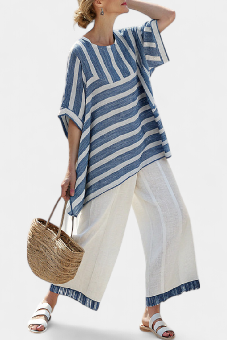 Veronica – sophisticated blue striped top and pants with details at the hem