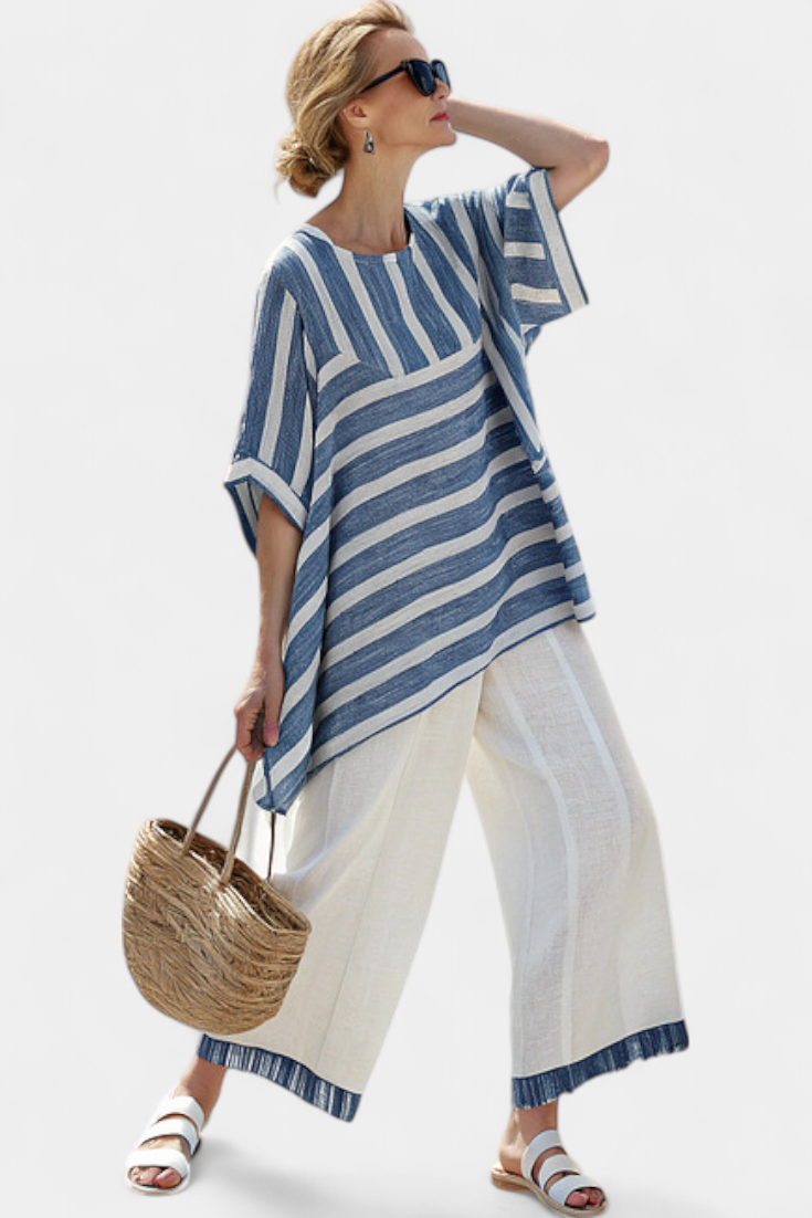 Veronica – sophisticated blue striped top and pants with details at the hem